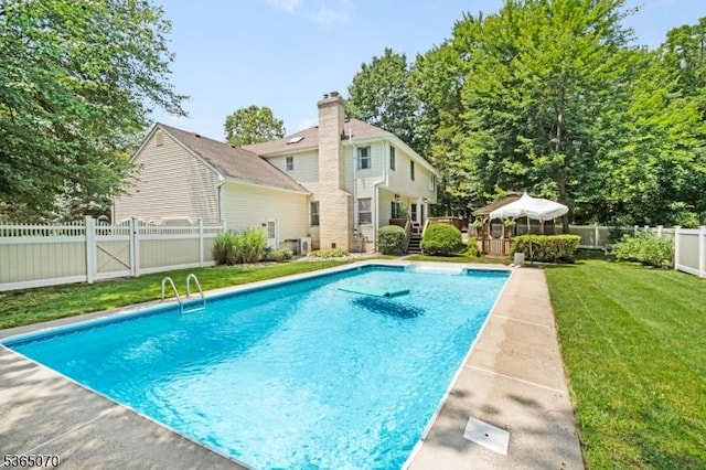 3310 Round Hill Rd, Branchburg Twp, NJ 08876 - view of pool with a wooden deck and a fenced backyard
