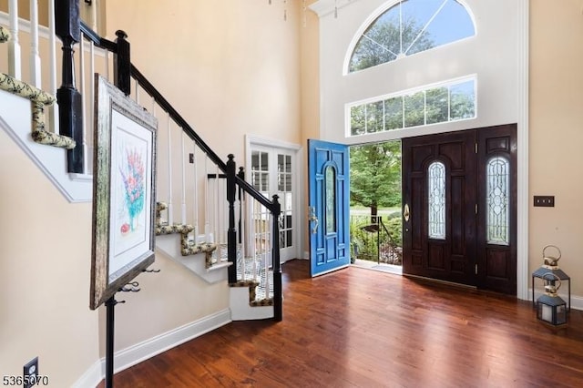 3310 Round Hill Rd, Branchburg Twp, NJ 08876 - entrance foyer featuring a towering ceiling, stairs, and wood finished floors