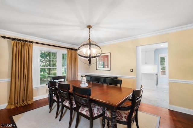 3310 Round Hill Rd, Branchburg Twp, NJ 08876 - dining space with a chandelier, crown molding, and wood finished floors