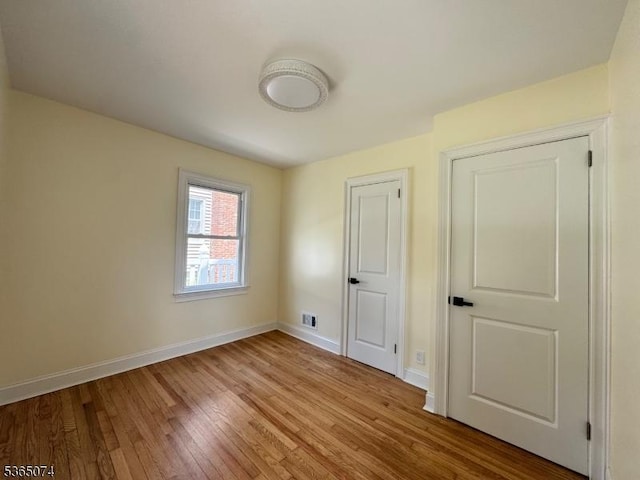882 Lafayette Ave, Hawthorne Boro, NJ 07506 - unfurnished bedroom featuring hardwood / wood-style flooring and baseboards