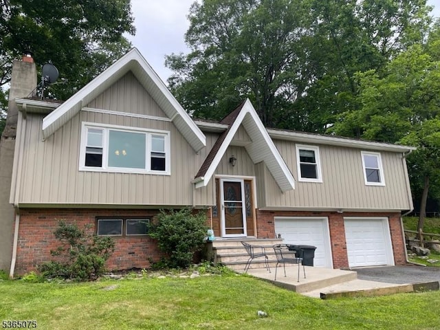 126 Hilltop Trl, Sparta Twp, NJ 07871 - split foyer home with brick siding, a garage, a front lawn, and a chimney