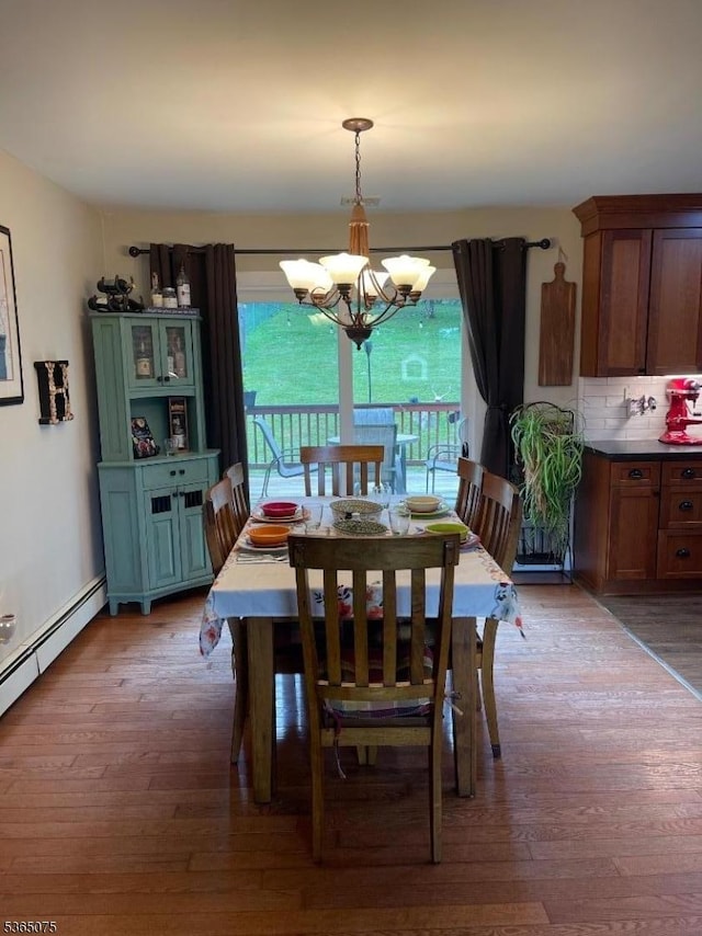 126 Hilltop Trl, Sparta Twp, NJ 07871 - dining space with light wood-style floors, a chandelier, and baseboard heating