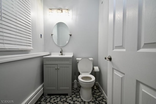 25 Lockwood Ave, Byram Twp, NJ 07874 - bathroom featuring vanity, tile patterned flooring, and a baseboard heating unit
