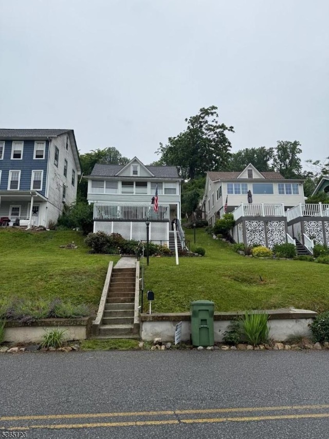 142 Lakeside Dr, Liberty Twp, NJ 07823 - view of front of property with stairs and a front lawn