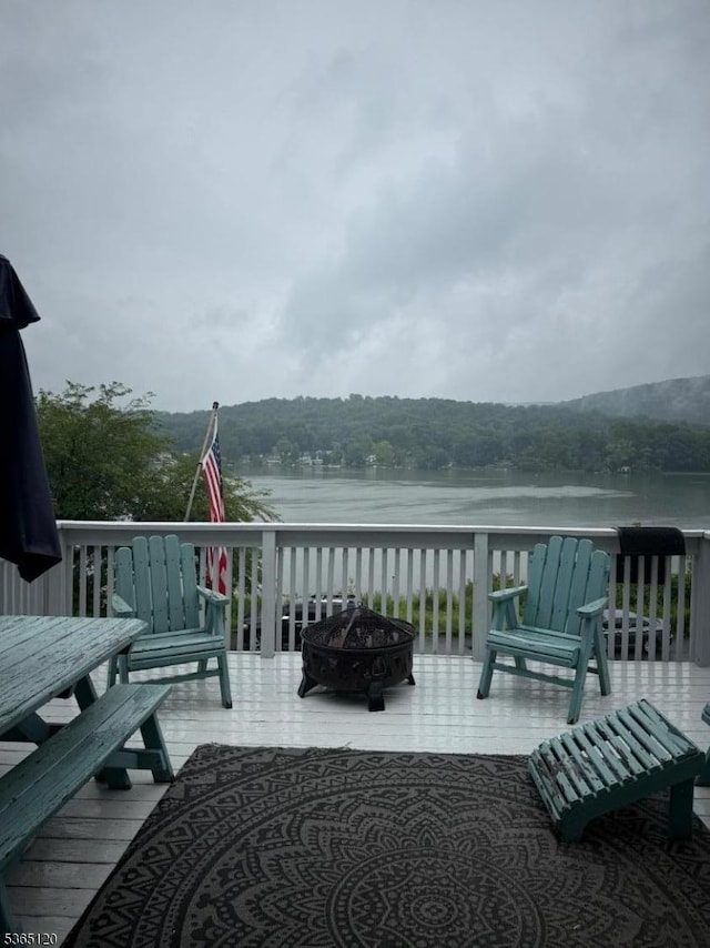 142 Lakeside Dr, Liberty Twp, NJ 07823 - wooden terrace featuring a fire pit and a water view