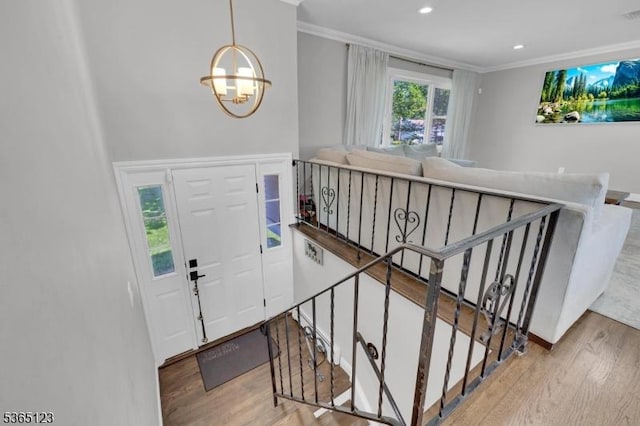 26 Robert St, Mount Olive Twp, NJ 07836 - entryway with wood finished floors, a chandelier, ornamental molding, and recessed lighting