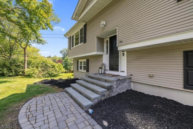 26 Robert St, Mount Olive Twp, NJ 07836 - doorway to property featuring a yard
