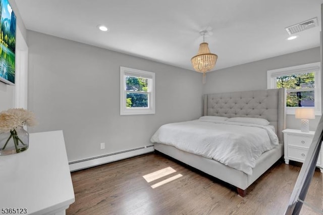 26 Robert St, Mount Olive Twp, NJ 07836 - bedroom with a baseboard radiator, multiple windows, wood finished floors, and recessed lighting