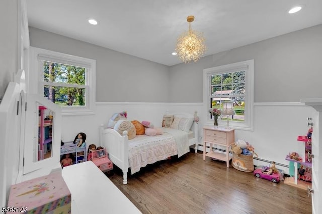 26 Robert St, Mount Olive Twp, NJ 07836 - bedroom featuring wainscoting, a chandelier, wood finished floors, recessed lighting, and baseboard heating