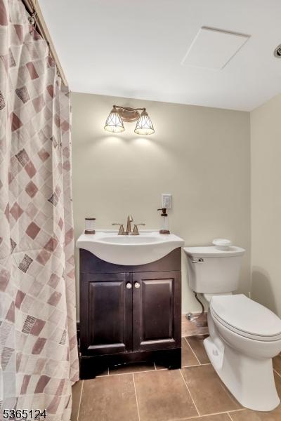76 Hillside Rd, Sparta Twp, NJ 07871 - full bathroom with tile patterned floors and vanity