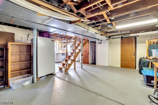 76 Hillside Rd, Sparta Twp, NJ 07871 - below grade area featuring freestanding refrigerator, washer / clothes dryer, and stairs