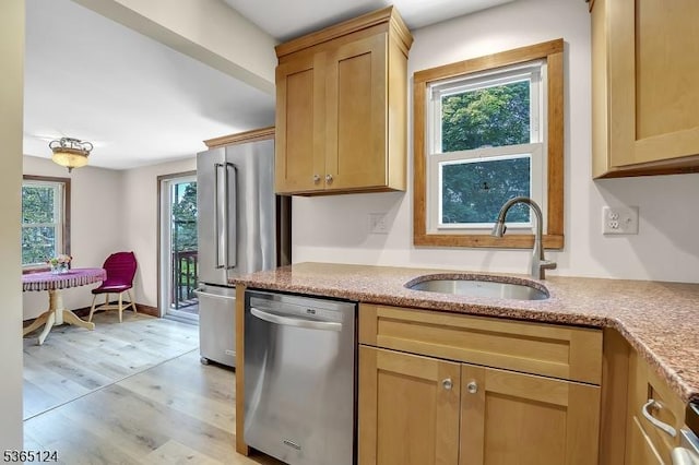 76 Hillside Rd, Sparta Twp, NJ 07871 - kitchen with appliances with stainless steel finishes, light wood-style floors, and light stone countertops