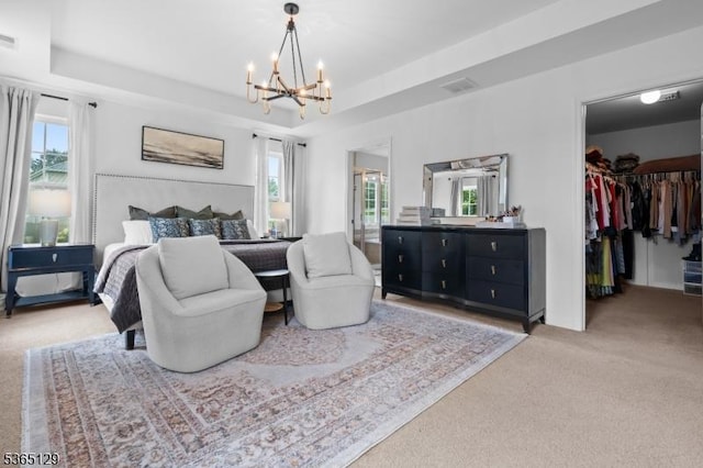 176 Randolph Ave, Mine Hill Twp, NJ 07803 - bedroom featuring light carpet, a chandelier, multiple windows, and a spacious closet