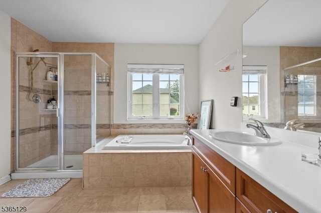 176 Randolph Ave, Mine Hill Twp, NJ 07803 - full bathroom featuring plenty of natural light, vanity, a garden tub, and a shower stall