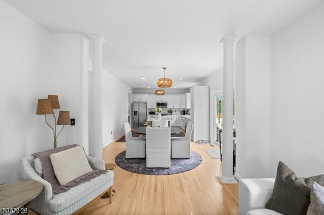 176 Randolph Ave, Mine Hill Twp, NJ 07803 - dining space with ornate columns, light wood-style flooring, and recessed lighting