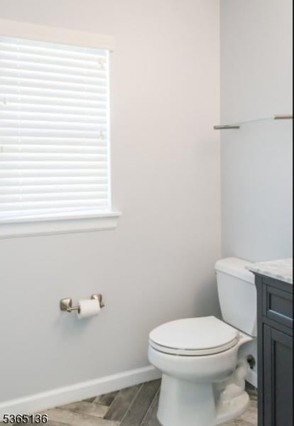 63 Rockcreek Ter, Riverdale Boro, NJ 07457 - half bathroom with vanity and wood finished floors