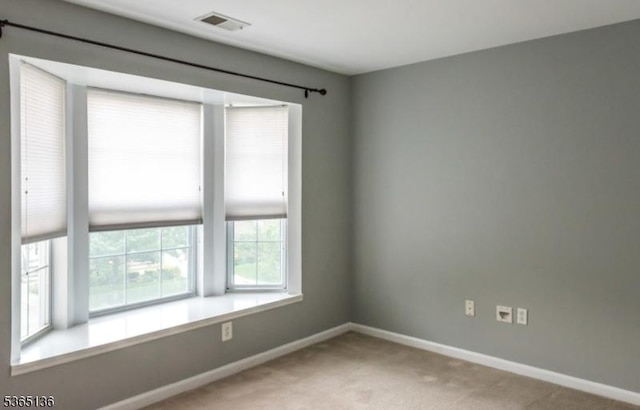 63 Rockcreek Ter, Riverdale Boro, NJ 07457 - carpeted spare room featuring baseboards