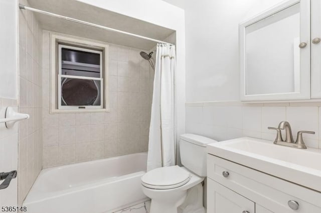 120 Westfield Ave Unit 12, Elizabeth City, NJ 07208 - full bath with tile walls, vanity, shower / bathtub combination with curtain, marble look tiles, and a wainscoted wall