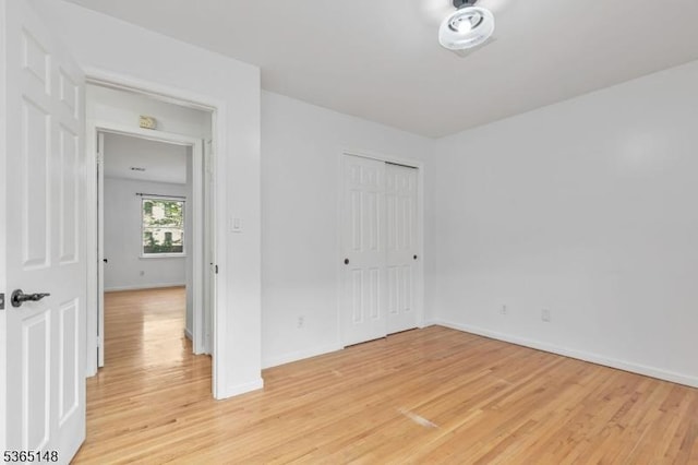 120 Westfield Ave Unit 12, Elizabeth City, NJ 07208 - unfurnished bedroom with light wood-style floors and a closet