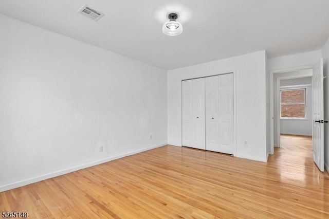 120 Westfield Ave Unit 12, Elizabeth City, NJ 07208 - unfurnished bedroom featuring light wood-type flooring and a closet