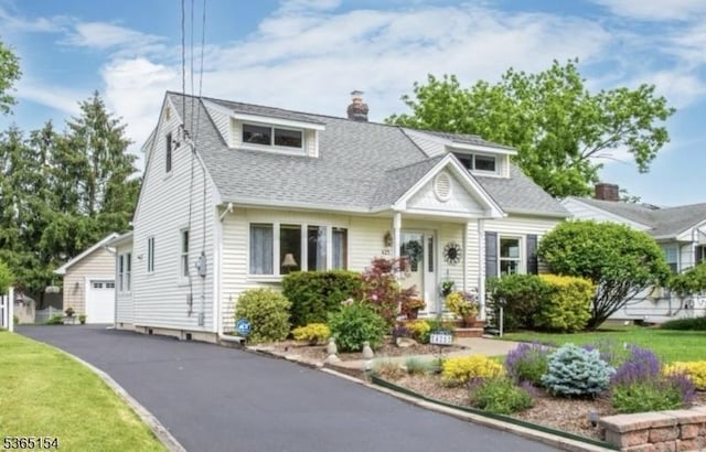 425 Broadway, Pompton Lakes Boro, NJ 07442 - bungalow featuring a chimney, roof with shingles, and a detached garage
