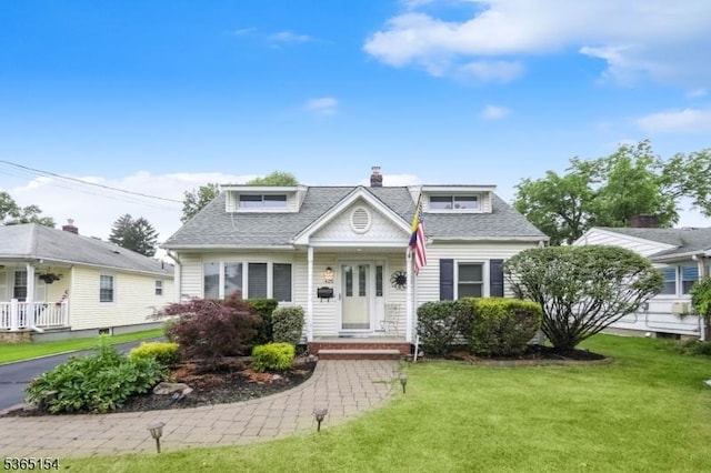 425 Broadway, Pompton Lakes Boro, NJ 07442 - bungalow-style home featuring a front lawn, a shingled roof, and a chimney