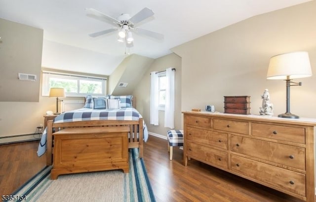 425 Broadway, Pompton Lakes Boro, NJ 07442 - bedroom featuring wood finished floors, vaulted ceiling, a baseboard radiator, and a ceiling fan