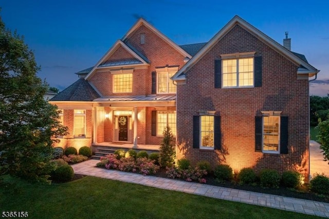 6 Cope Ct, Hillsborough Twp, NJ 08844 - view of front of property with brick siding, a chimney, and covered porch
