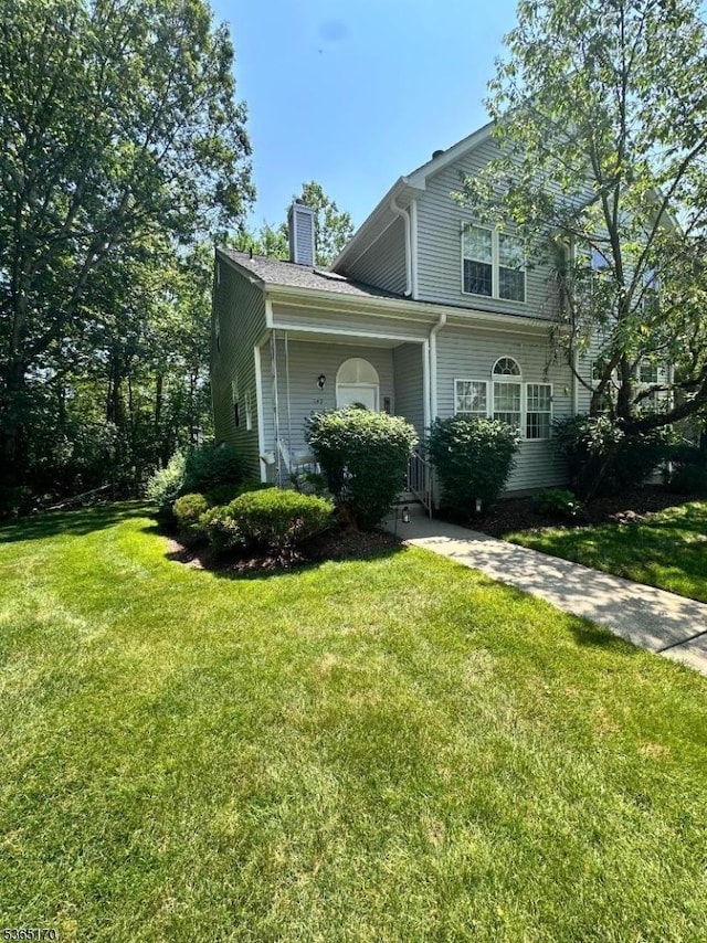 149 Wingate Dr, Independence Twp, NJ 07840 - view of front of home featuring a chimney and a front yard