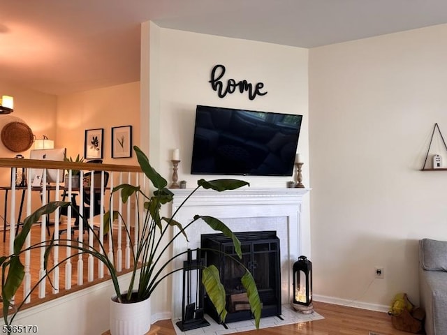 149 Wingate Dr, Independence Twp, NJ 07840 - living area featuring wood finished floors and a tiled fireplace