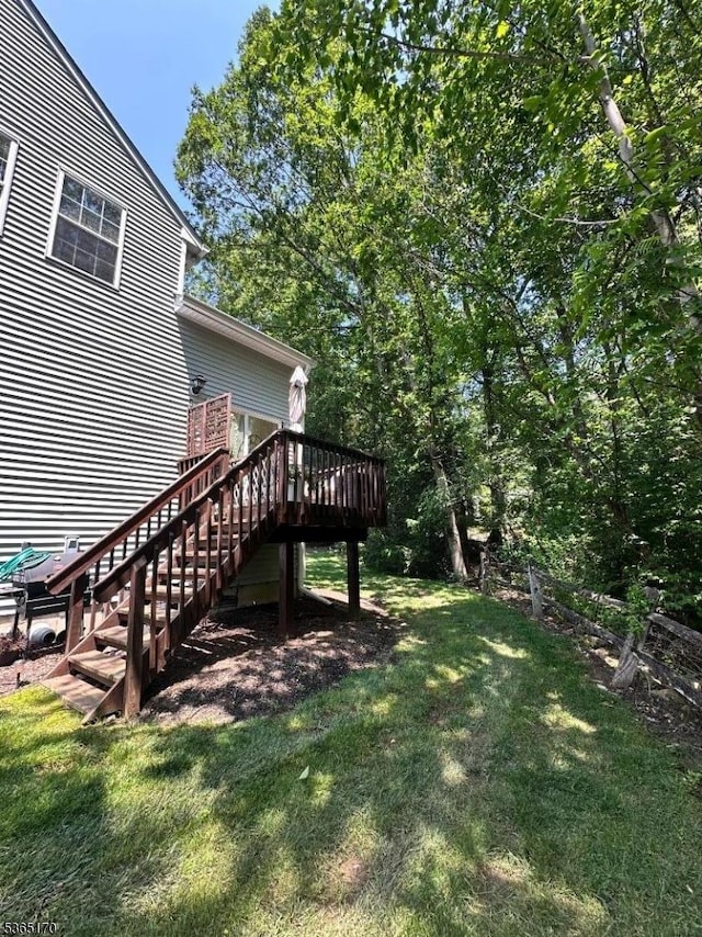 149 Wingate Dr, Independence Twp, NJ 07840 - view of grassy yard with stairway and a deck