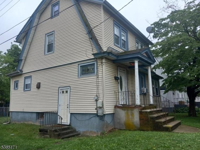 1368 E 2nd St, Plainfield City, NJ 07062 - rear view of property with a yard and a gambrel roof