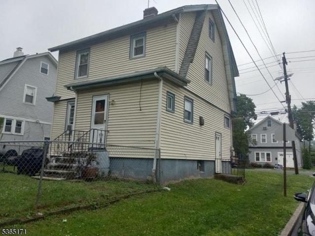 1368 E 2nd St, Plainfield City, NJ 07062 - back of house with a chimney