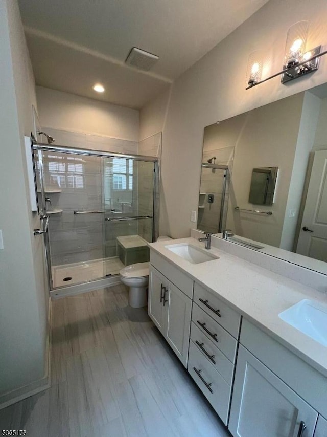 77 Norton Rd, Hillsborough Twp, NJ 08844 - full bath with a stall shower, double vanity, and recessed lighting