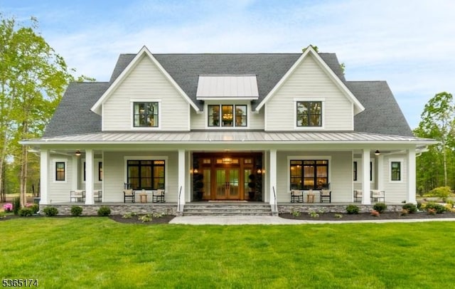2 County Line Rd, Mendham Boro, NJ 07945 - modern farmhouse with covered porch, a standing seam roof, a front lawn, and a metal roof
