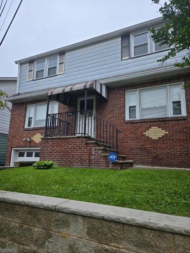 267 William St, Belleville Twp, NJ 07109 - view of front of property with brick siding and a front yard
