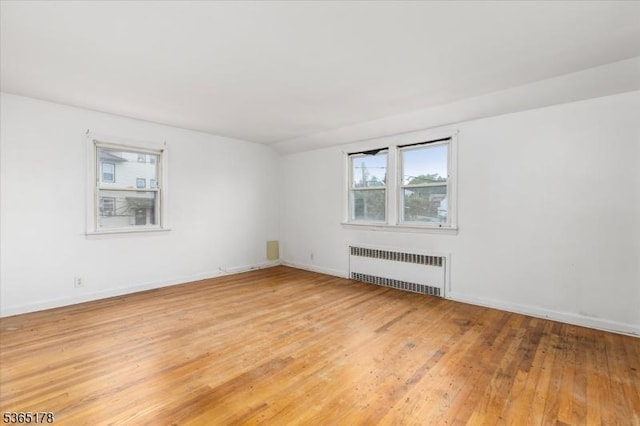 267 William St, Belleville Twp, NJ 07109 - unfurnished room with radiator and light wood-type flooring