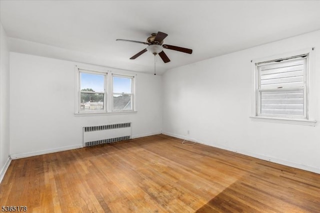 267 William St, Belleville Twp, NJ 07109 - empty room with radiator, ceiling fan, and wood finished floors