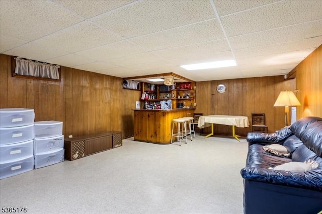 267 William St, Belleville Twp, NJ 07109 - living area with a dry bar, wood walls, and a paneled ceiling