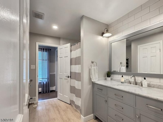 26 Knollwood Rd, Hanover Twp, NJ 07981 - full bathroom featuring vanity, wood finished floors, recessed lighting, and curtained shower