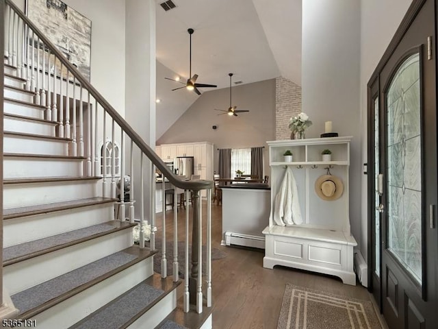 26 Knollwood Rd, Hanover Twp, NJ 07981 - stairs with wood finished floors, a baseboard radiator, high vaulted ceiling, and ceiling fan