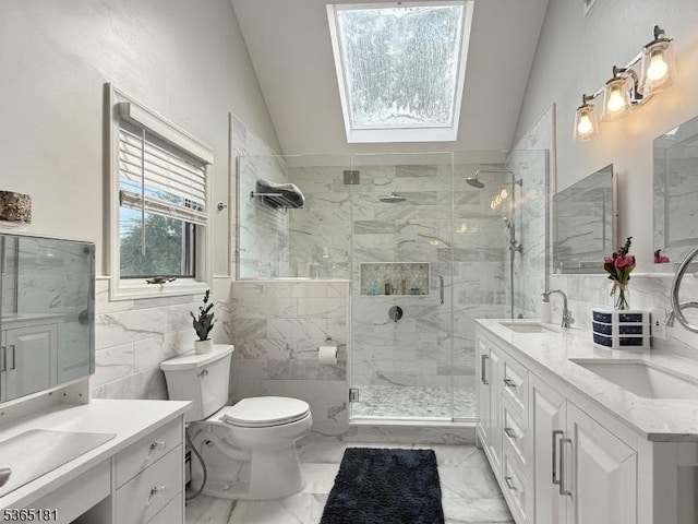 26 Knollwood Rd, Hanover Twp, NJ 07981 - full bath with lofted ceiling, a skylight, tile walls, marble finish flooring, and a stall shower