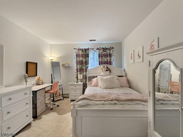 26 Knollwood Rd, Hanover Twp, NJ 07981 - bedroom with light carpet and an office area