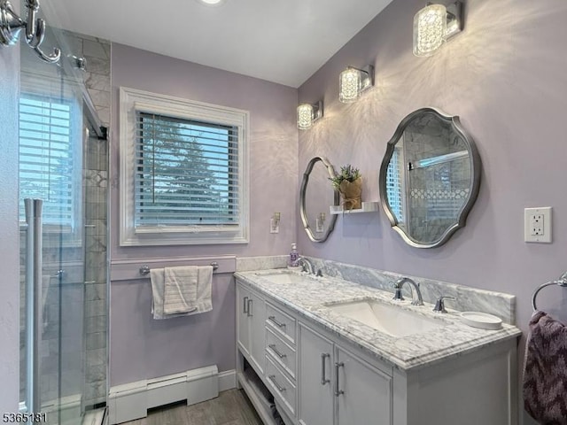 26 Knollwood Rd, Hanover Twp, NJ 07981 - full bath featuring a baseboard radiator, plenty of natural light, double vanity, and a stall shower