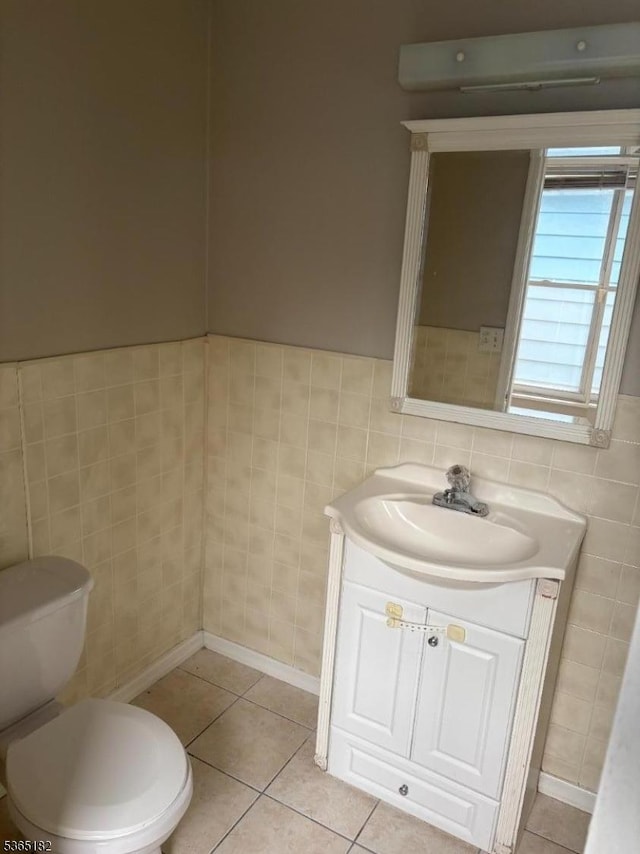 552 Liberty St, City Of Orange Twp, NJ 07050 - half bathroom featuring tile walls, vanity, and tile patterned floors