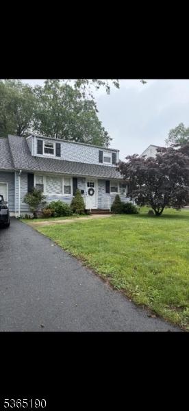 15 Equator Ave, South Bound Brook Boro, NJ 08880 - townhome / multi-family property featuring a front lawn