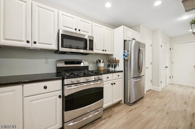 9 Mahogany Way, Randolph Twp, NJ 07869 - kitchen with stainless steel appliances, light wood-style floors, white cabinetry, and recessed lighting