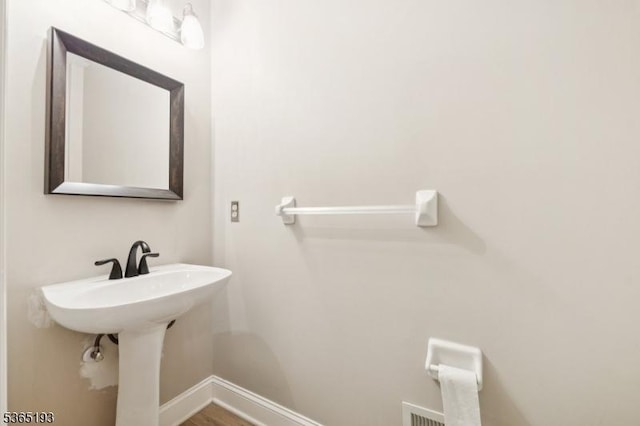 9 Mahogany Way, Randolph Twp, NJ 07869 - bathroom featuring baseboards and wood finished floors