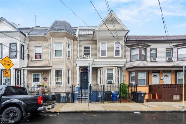 93 Garside St, Newark City, NJ 07104 - view of property featuring a fenced front yard and cooling unit
