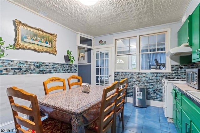93 Garside St, Newark City, NJ 07104 - tiled dining room featuring an ornate ceiling and french doors